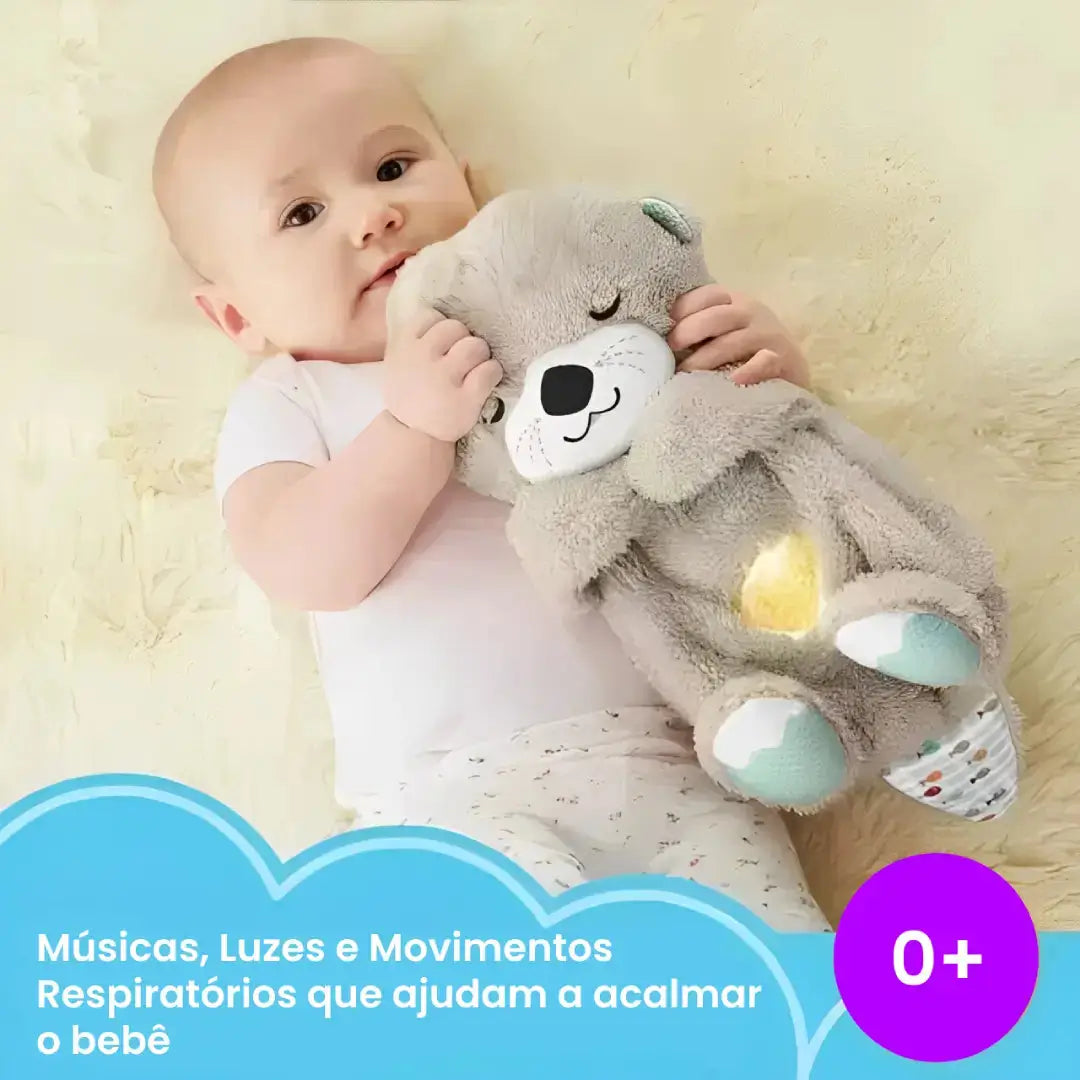 Lontrinha Calm ™ - Pelúcia que Respira com Som Relaxante para um Sono Tranquilo